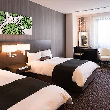 Osaka Airterminal Hotel Toyonaka Extérieur photo